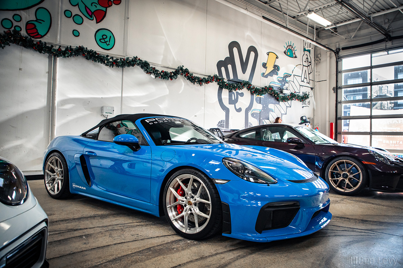 Blue Porsche 718 Spyder at Alpha Garage Chicago