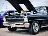 Front of Black Chevy II at Branding Iron Car Show