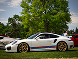 Side of White Porsche 911 Turbo with Martini Stripes