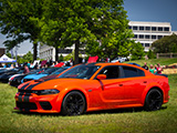 Orange Dodge Charger SRT 392 in the Grass
