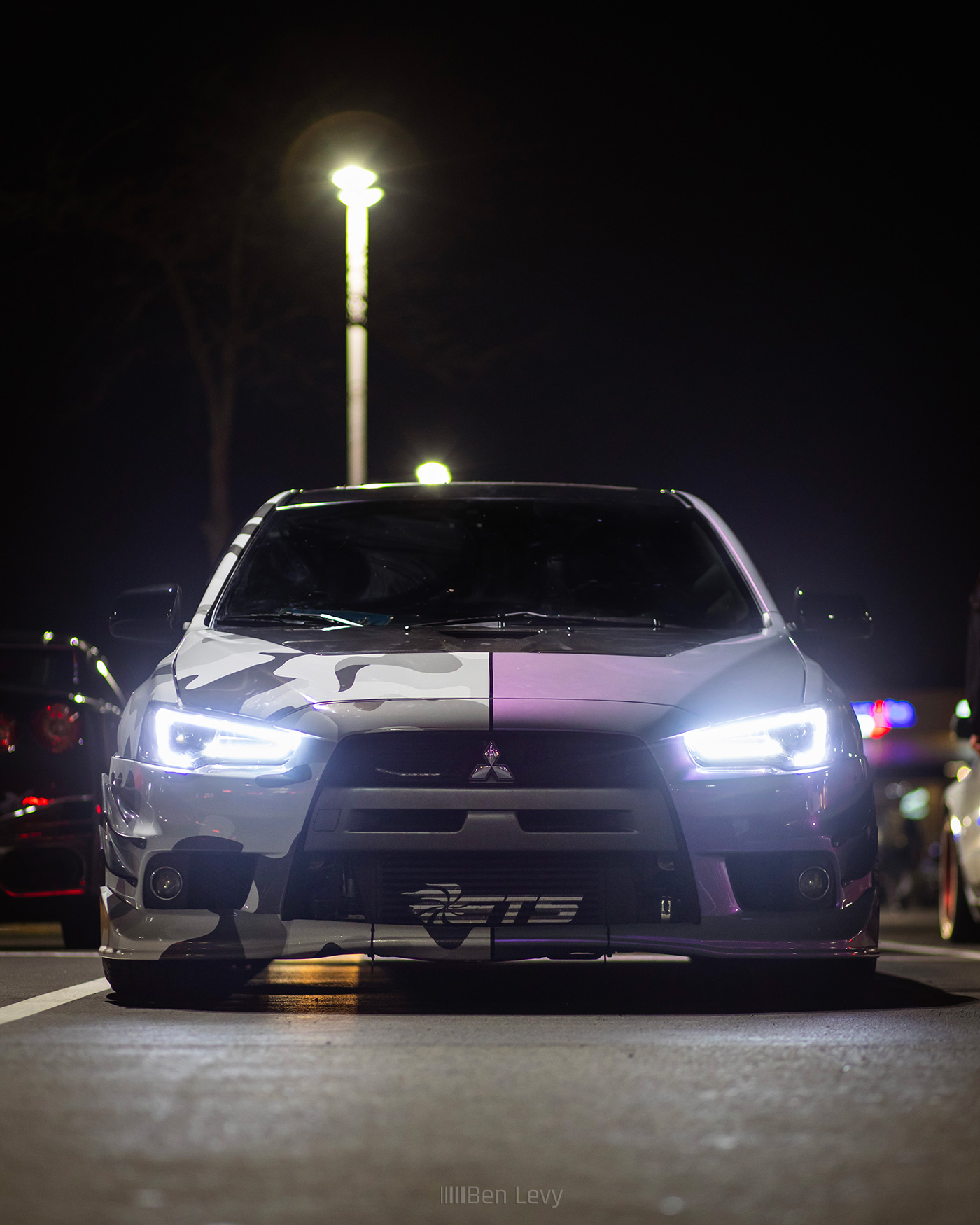 Front of Mitsubishi Lancer Evo X at Night
