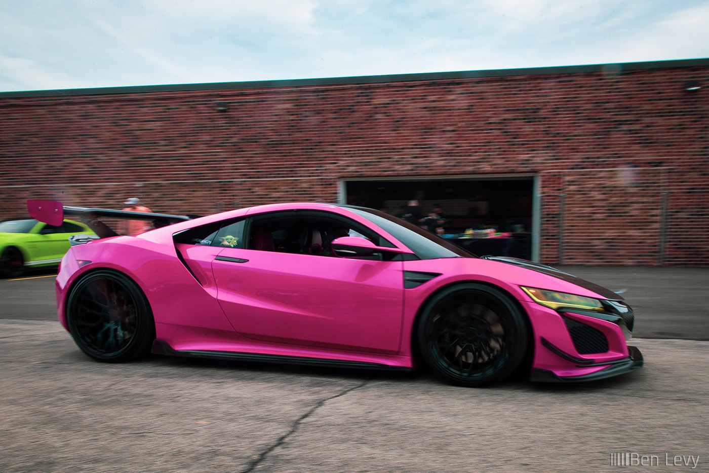 Pink Acura NSX leaving Chicago Auto Pros Lombard