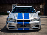 Front of Silver R34 Nissan Skyline GT-R with Blue Stripes