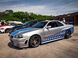 Silver R34 Nissan Skyline GT-R with Blue Graphics