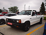 White Mazda Pickup Truck with Rotary Swap