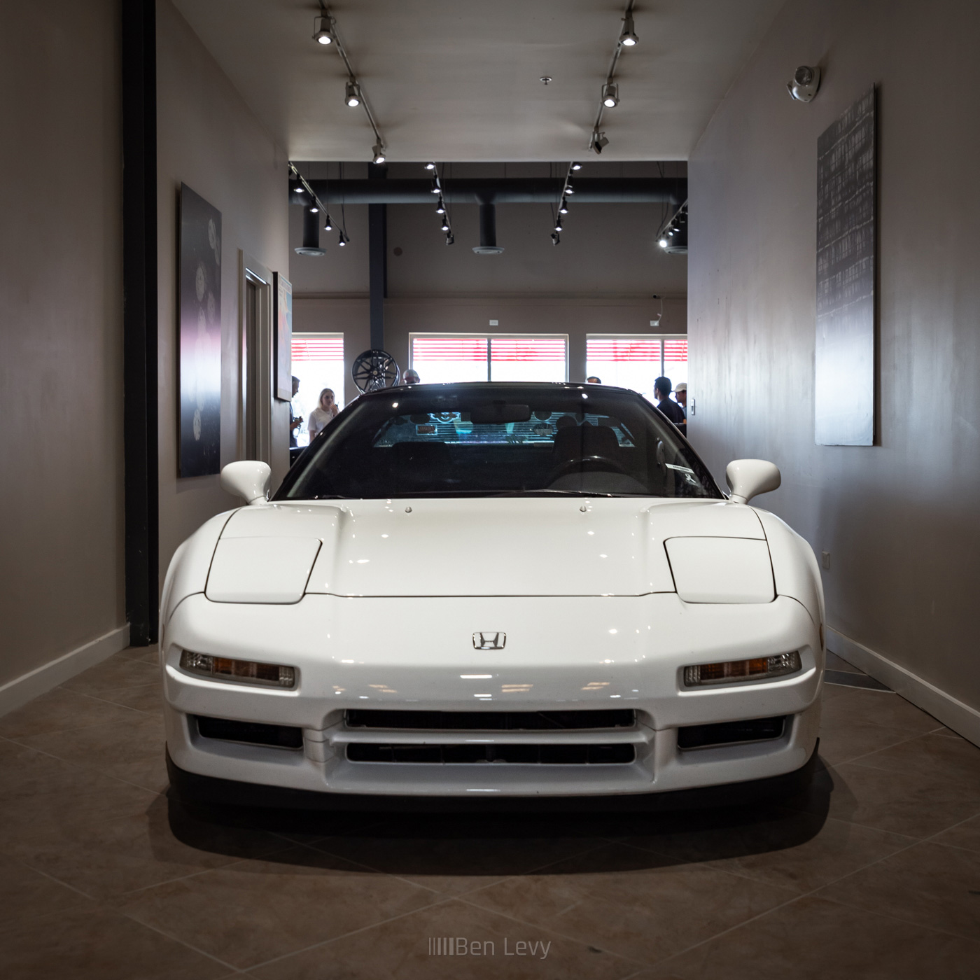 Front of a White Acura NSX at Mancuso Collision