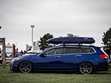 Blue Acura TSX Sport Wagon with Cargo Carrier