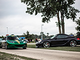 Green Lotus Evora and Black Porsche Cayman
