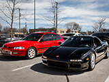 Red Honda Civic and Black Acura NSX
