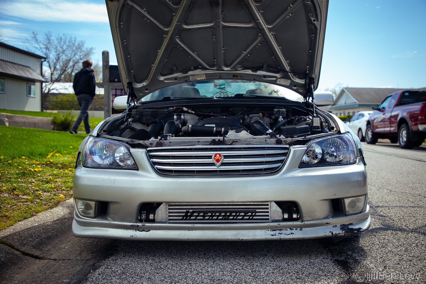 Silver Lexus IS300 with Altezza Grill