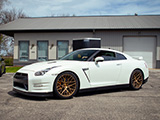 White Nissan GT-R on Gold Rohana Wheels