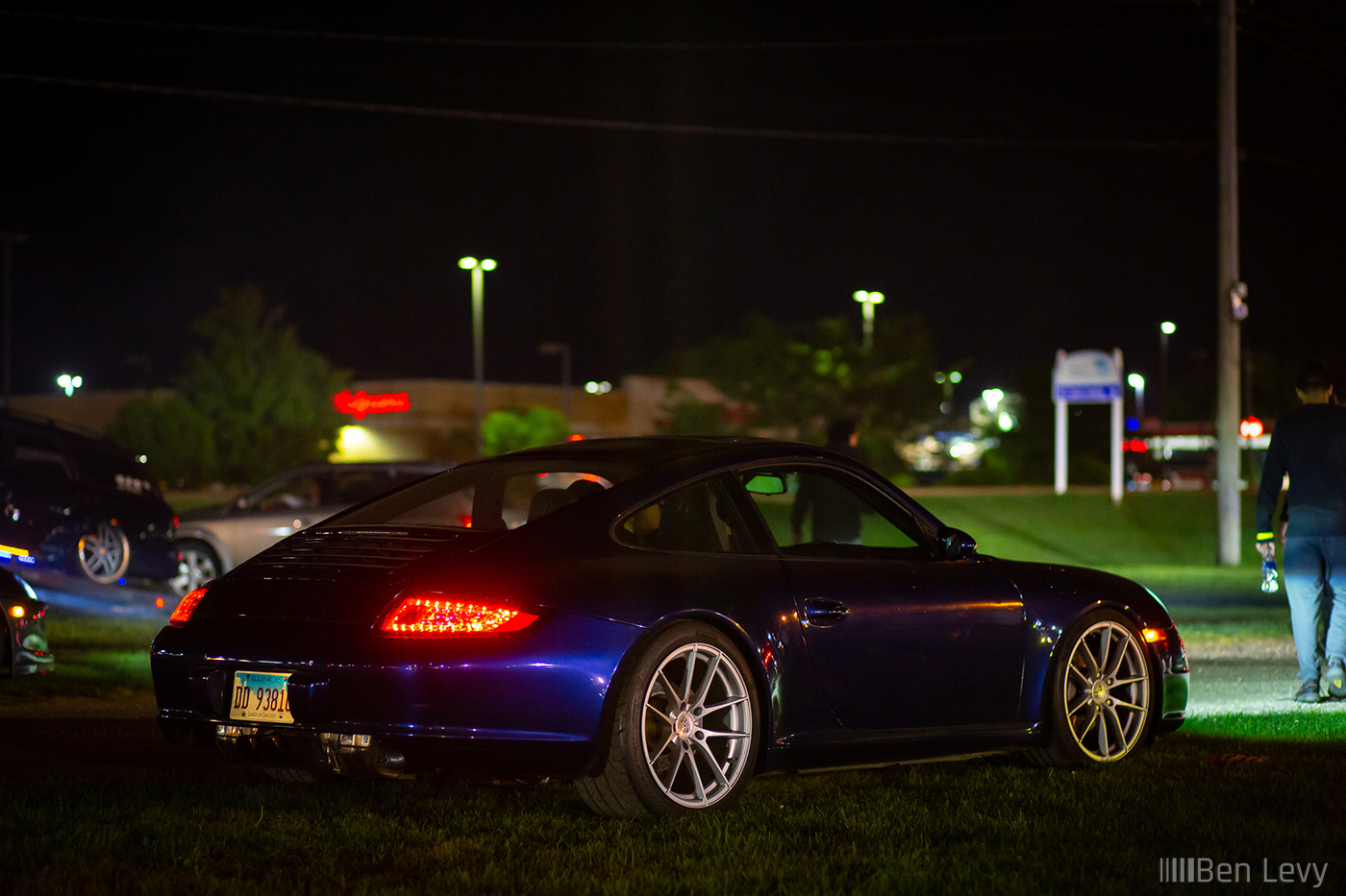 Blue Porsche 911 in the field at Rockford Speedway