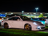 White Porsche 911 on Gold Wheels at Night