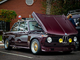 Burgundy BMW 2002 at a Cars & Coffee
