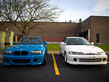 Blue BMW M3 and White Acura Integra Sedan