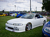 Bagged White Nissan Silvia at Car Show in Rockford