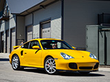 Yellow Porsche 911 Turbo at Iron Gate in Naperville
