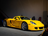 Yellow Porsche Carrera GT in Big Door Garage