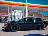 Side of Black Dodge Challenger SRT Hellcat at Gas Station in WI