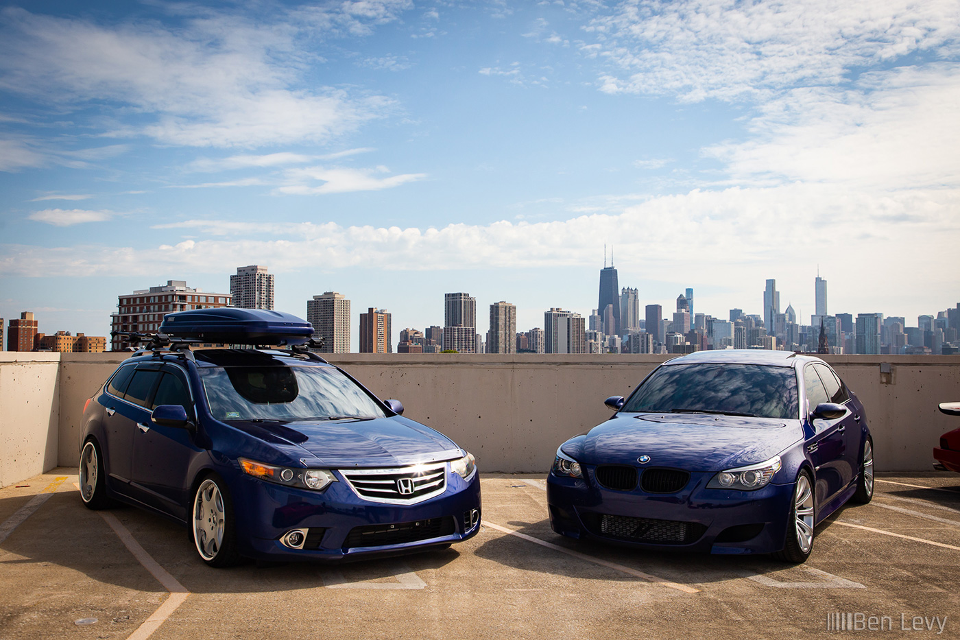 Blue Acura TSX and BMW M5 in Chicago
