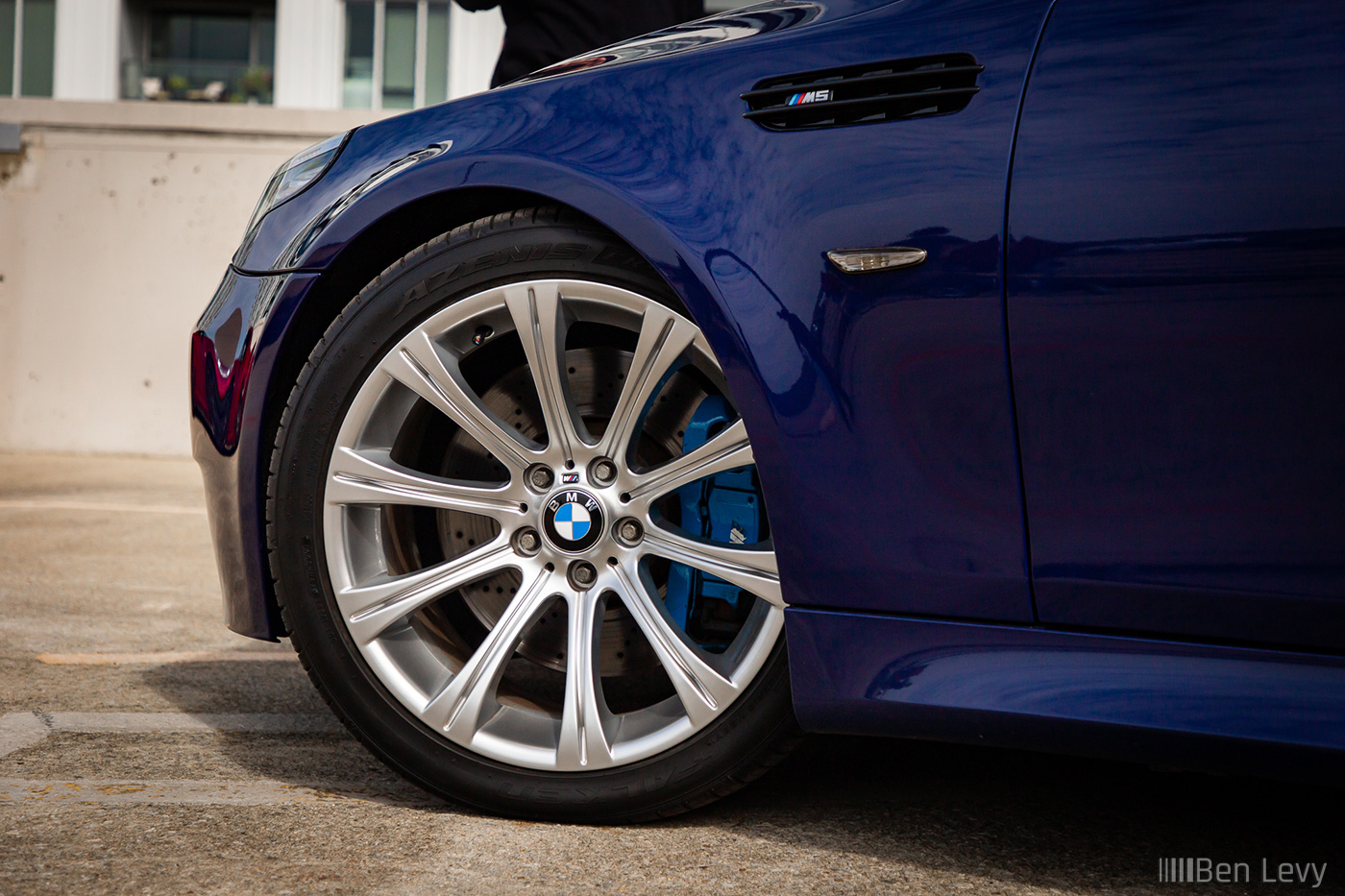 Front Wheel of a Blue E60 BMW M5