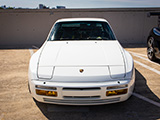 Front of White Porsche 944 in Parking Lot