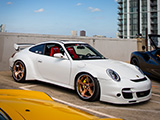 White Porsche 911 on Gold Wheels