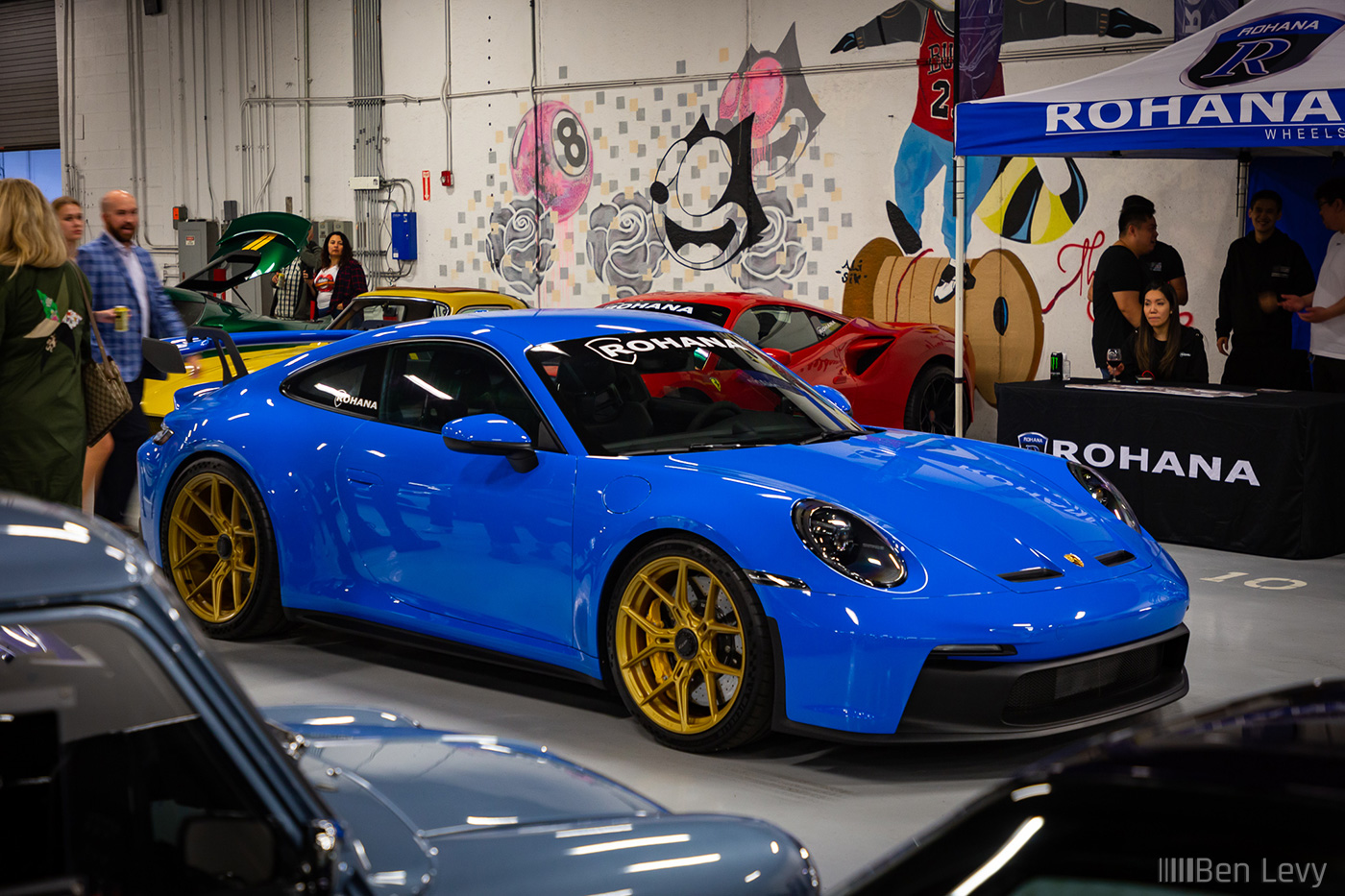 Blue Porsche GT3 on Gold Rohana Wheels