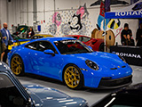 Blue Porsche GT3 on Gold Rohana Wheels