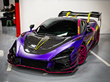 Exposed Carbon Fiber and Purple Wrap on McLaren 720S