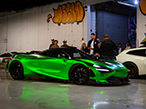 Green McLaren 720S Leaving Alpha Garage