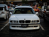 Front of White E38 with custom headlights
