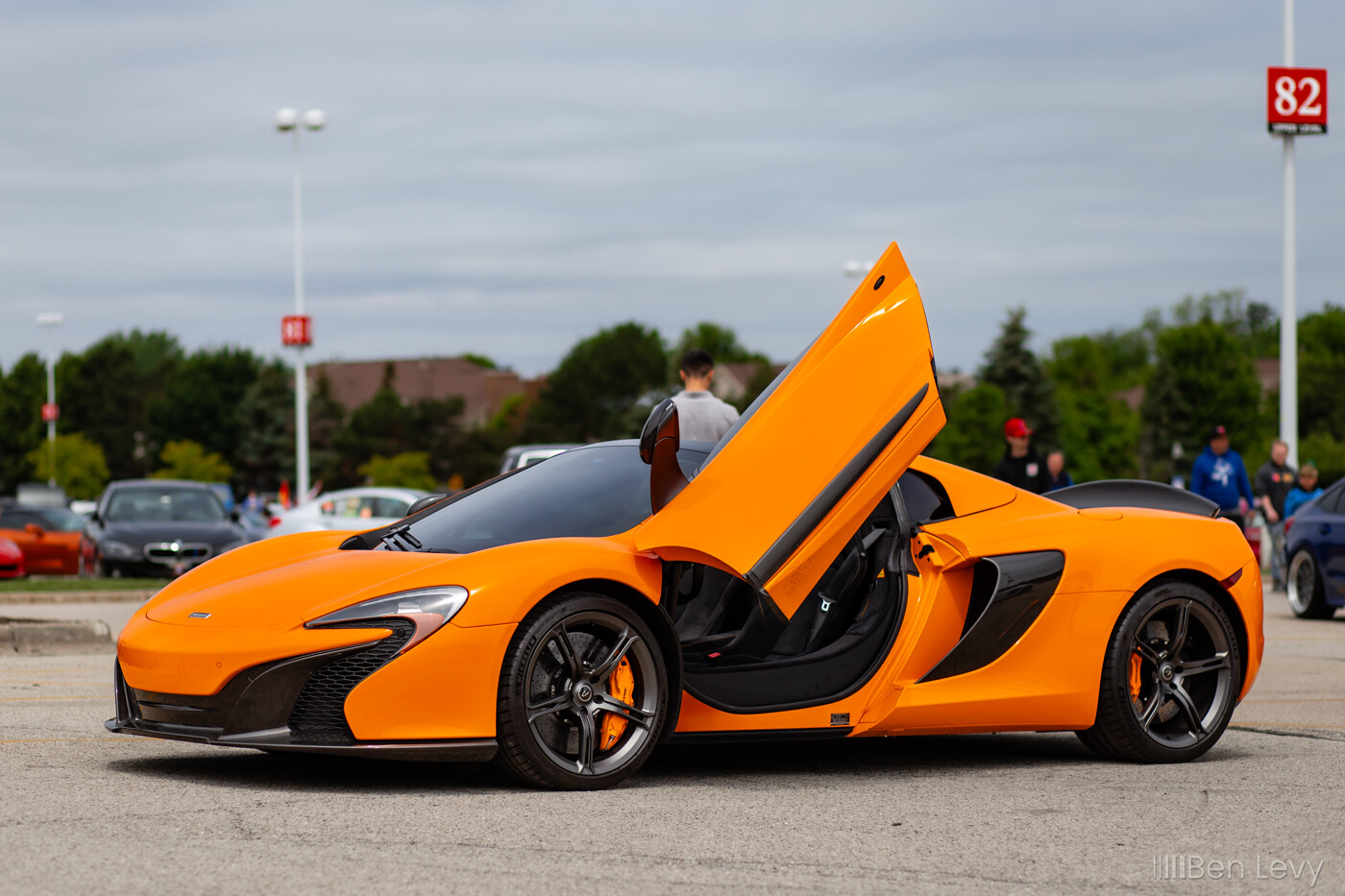 Orange McLaren 650S with a door open