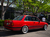 Rear Quarter of a Red BMW 325i