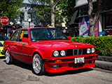 Red BMW 325i at Cars & Coffee Oak Park