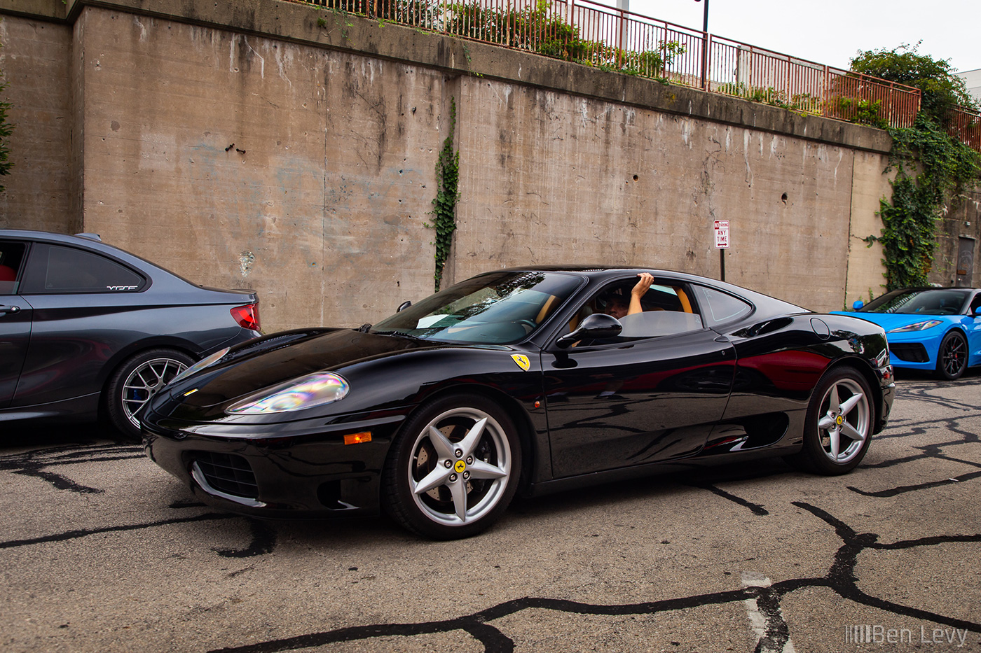 Black Ferrari 360 Modena passing through Cars & Coffee Oak Park