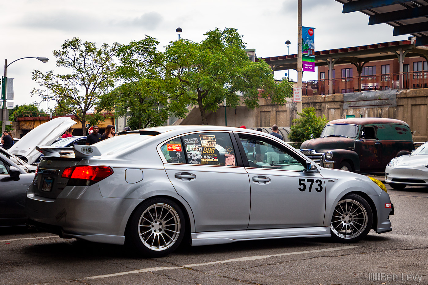 Silver H6 Subaru Legacy with Number 573