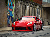 Red Nissan 370Z with Tinted Windshield