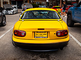 Rear of Yellow Mazda Miata at Car Meet