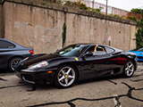 Black Ferrari 360 Modena passing through Cars & Coffee Oak Park