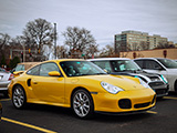 Yellow Porsche 911 Turbo in River Forest Parking Lot