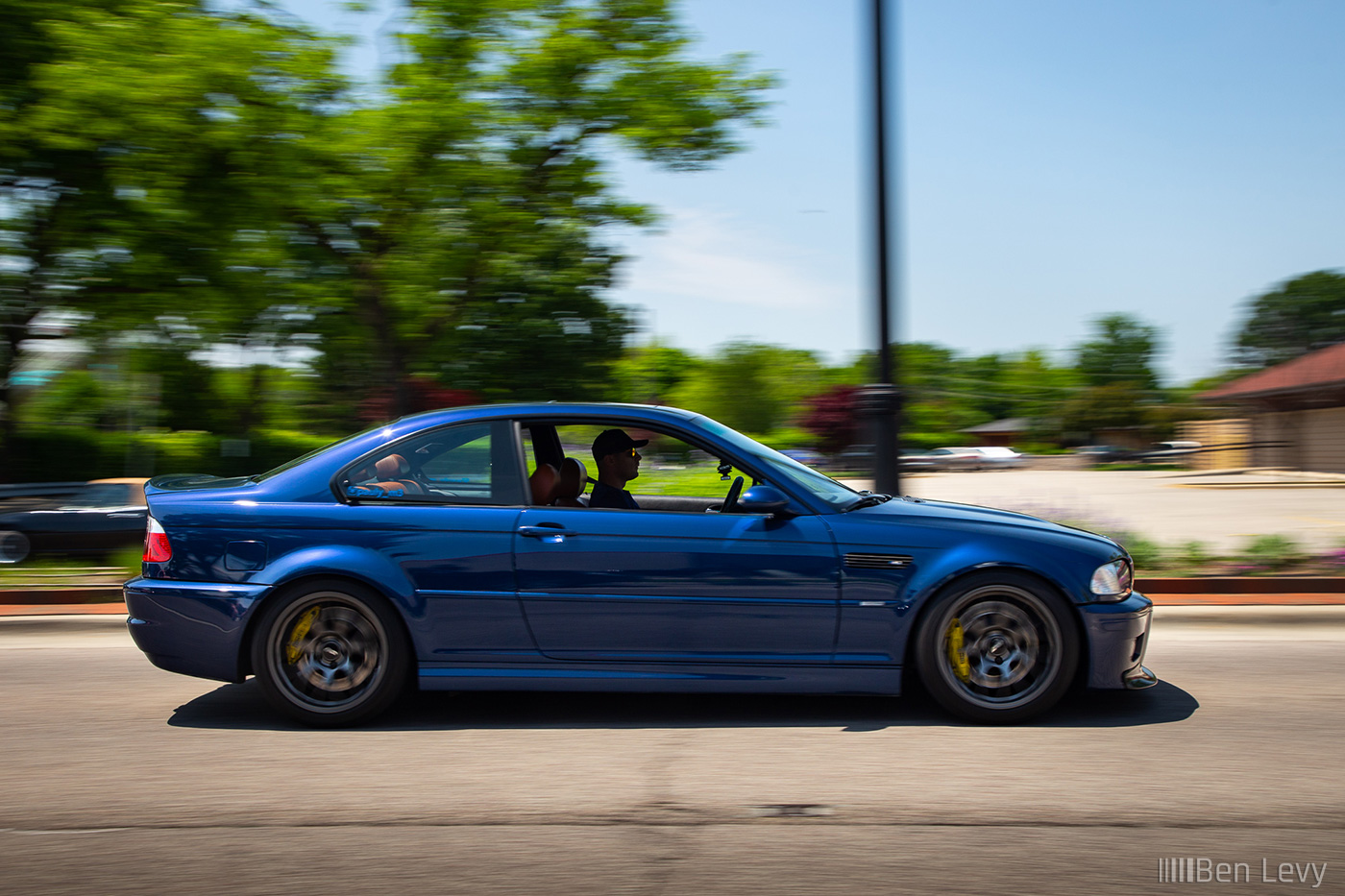 Blue E46 BMW M3 driving in Lincolnwood