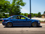 Blue E46 BMW M3 driving in Lincolnwood