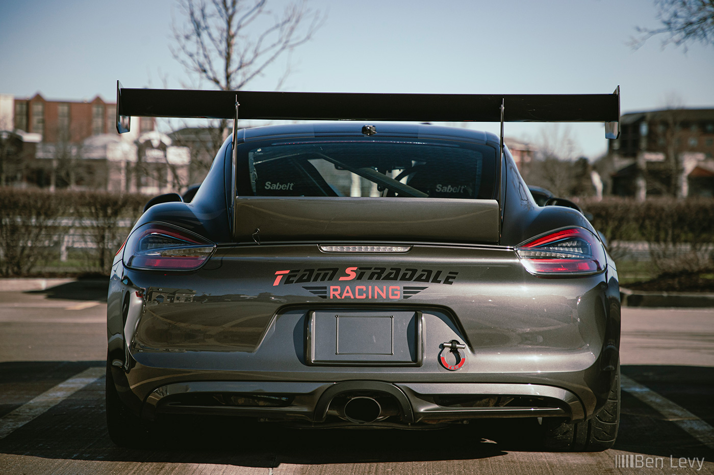 Rear of Grey Porsche Cayman GT4 from Team Stradale Racing