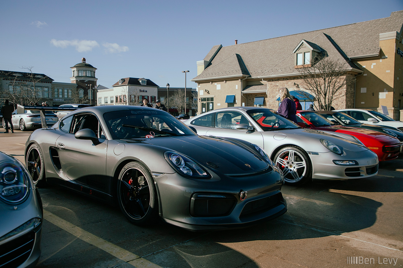 Grey Cayman GT4 and Silver Carrera S at Porsches & Pastries