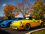 Cayman GT4 and Porsche 911 SC at a car meet in Lake Forest, IL