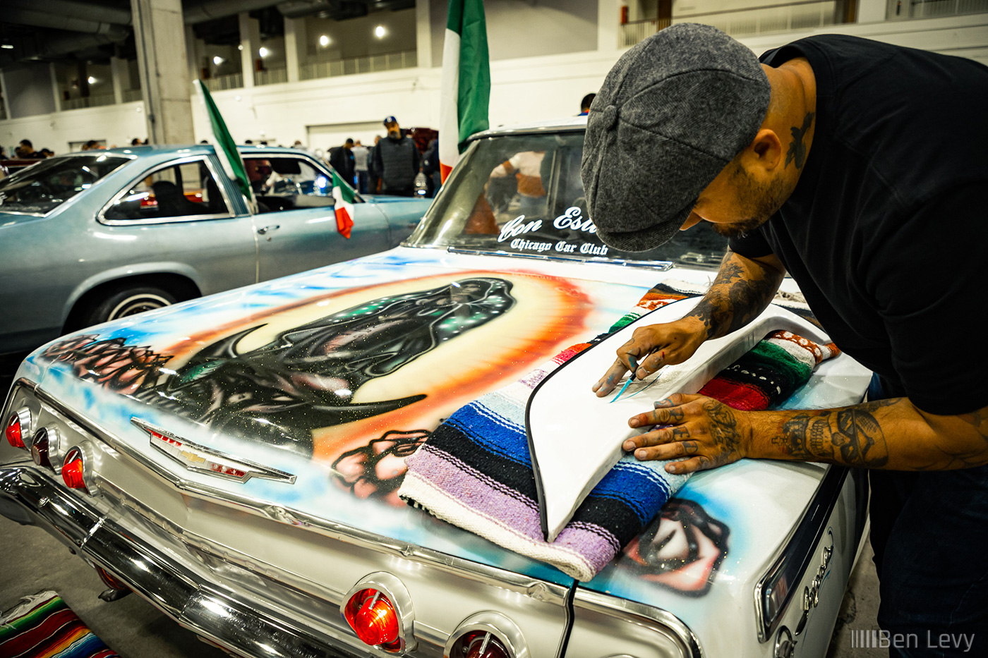 Jerry Chingas doing custom pinstriping at the Slow & Low Car Show