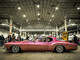 Side of Pink Buick Riviera at Slow & Low Chicago Lowrider Festival