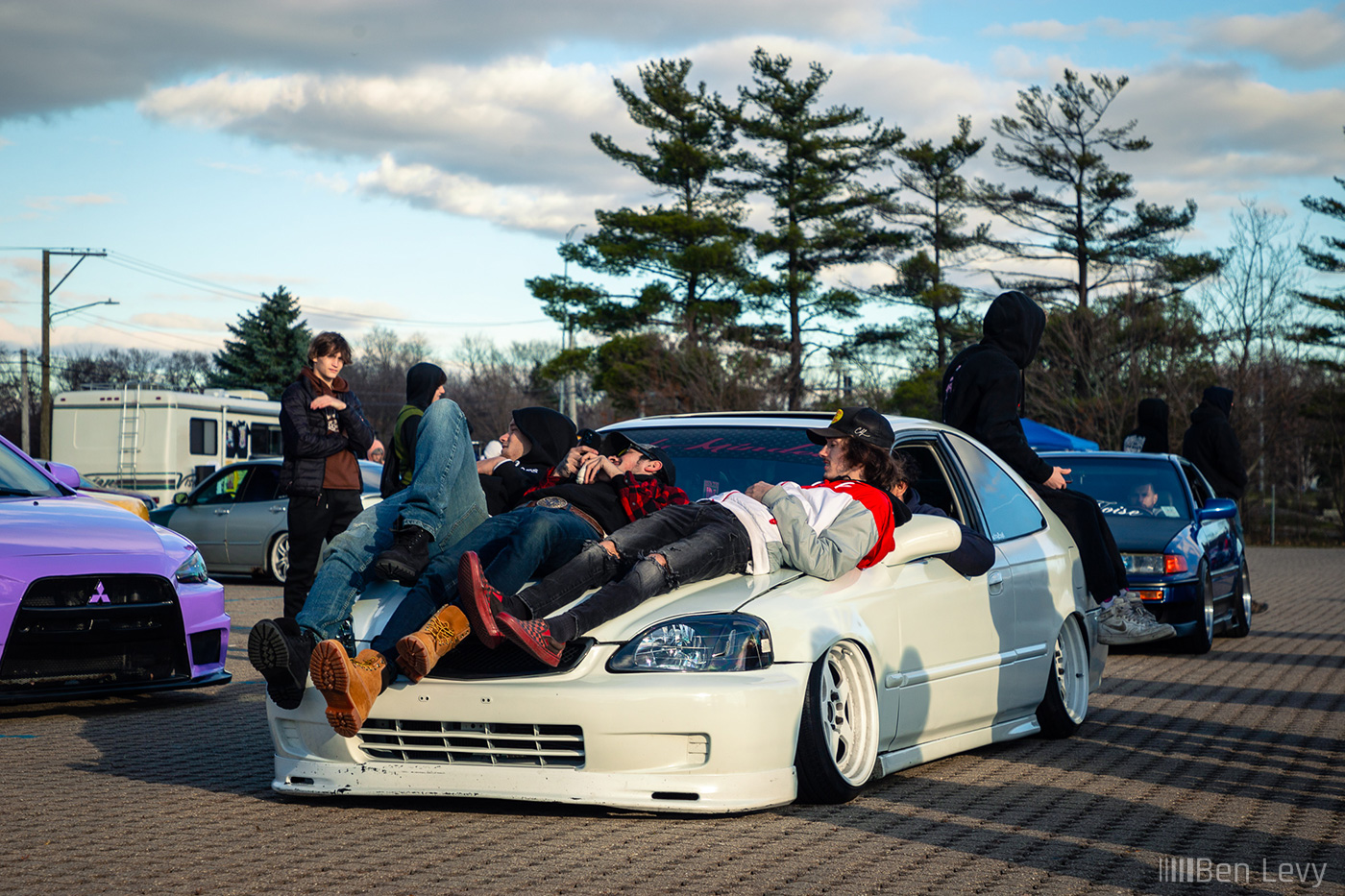 Laying on a Civic For Low Car Limbo