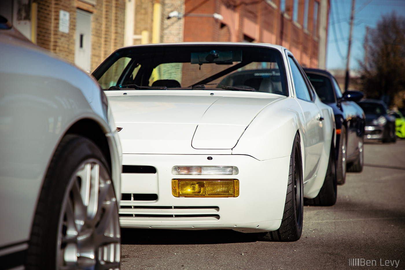 Yellow Foglight on White Porsche 944 Turbo